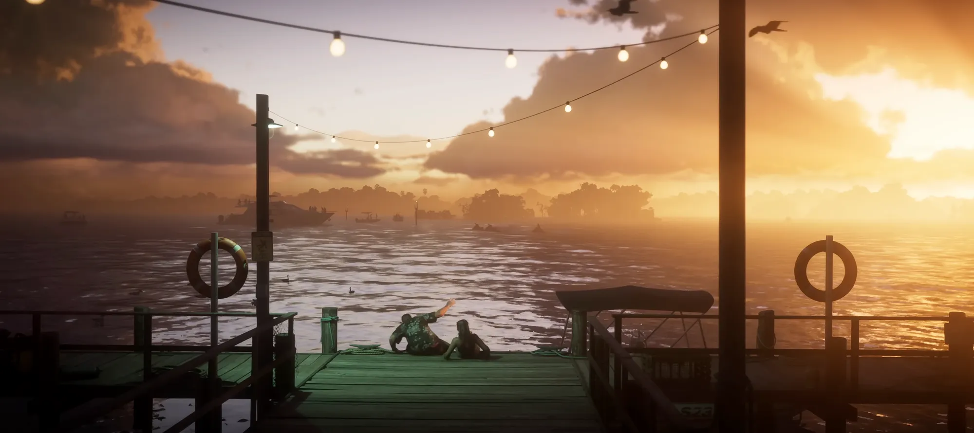 Cảnh hoàng hôn trên cầu tàu trong trailer GTA 6, hai nhân vật ngồi ngắm biển